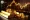 Gold Bars on Financial Graphs Amid US-Iran Geopolitics