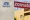 Split image showing Tata logo on a pale wall on the left and a red Zomato sign over a beige building on the right