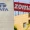 Tata vs Zomato Legacy Meets Agility 1 The Portfolio Split image showing Tata logo on a pale wall on the left and a red Zomato sign over a beige building on the right